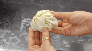 Spiral shaped savory Turkish pastry made with thin phyllo dough and spinach filling.