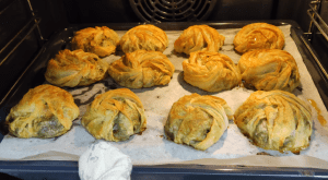 A plate of authentic Turkish spinach and cheese borek rolls, perfect for breakfast or tea time.