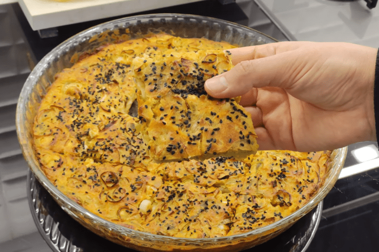 Homemade healthy no-dough leek borek with a golden cornmeal crust.