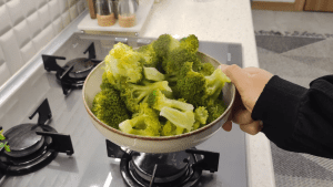 Tender, boiled broccoli florets drained well and placed on a baking tray lined with parchment paper.