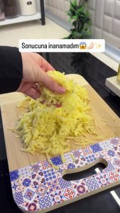 Grating potatoes and squeezing out excess water for the crispiest Turkish potato wrap base.