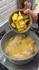Mixing lemon juice and flour to create the traditional Turkish "terbiye" for the stew.