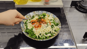 Internal filling for Hamsi Kusu made with finely chopped green onions, parsley, grated cheese, and spices.