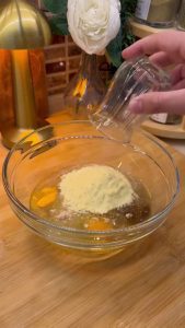Adding cornmeal and white flour to the liquid base for a crunchy texture.
