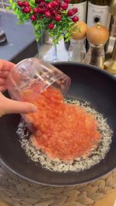 Boiling the shaped bulgur meatballs in a large pot of salted water until they float.