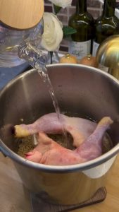The view of perfectly cooked soft wheat and chicken after 50 minutes in the pressure cooker.
