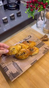 The final result: Golden brown and crumbly Turkish dill pastries fresh from the oven.