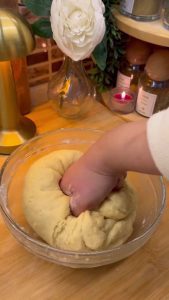 Kneading the smooth, firm dough for bite-sized Turkish cookies.