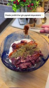 Mixing all-purpose flour with cumin, paprika, and oregano in a glass bowl.