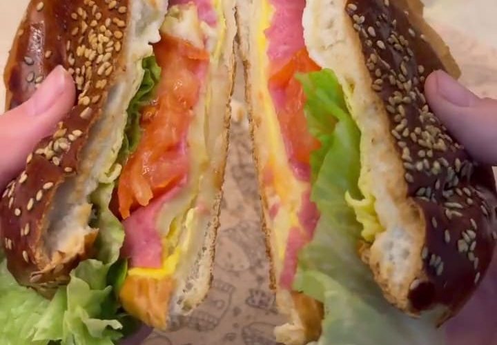 A toasted one-pan breakfast sandwich with melting kashar cheese, egg, and salami.