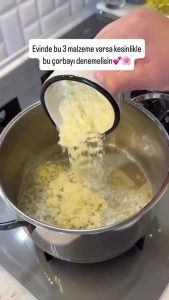 Sautéing cornmeal in melted butter in a pot until golden and fragrant.