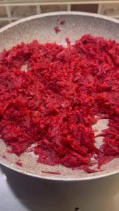 Sautéed beets cooling in a pan.