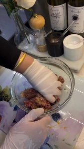 Resting meatball mixture in a bowl to enhance flavor and texture.