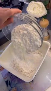 Kneading a soft yeast dough for Turkish flatbread.