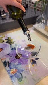 Mixing paprika and oil for a whole chicken marinade.