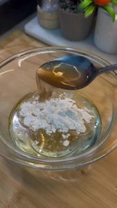 Whisking the vinegar and flour sauce for the yufka base.