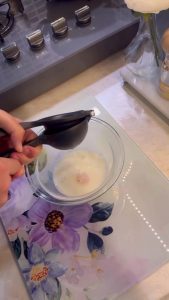 Whisking milk, egg, and lemon for a Turkish soup tempering.